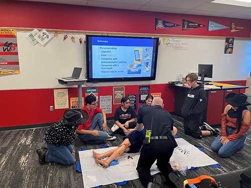 Students participating in a stop the bleed training