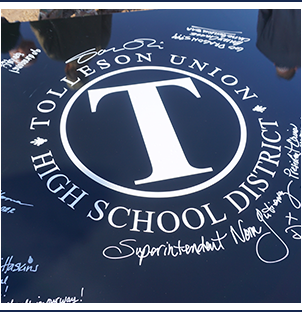 Tolleson Union High School District logo on a plaque signed by leadership team